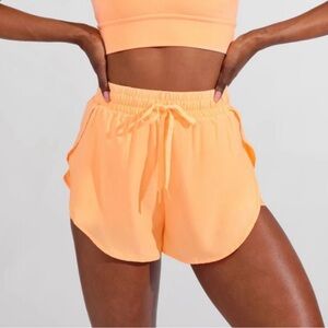 NOT FOR SALE!!! ISO a pair of size small peach ring lifesaver shorts.
